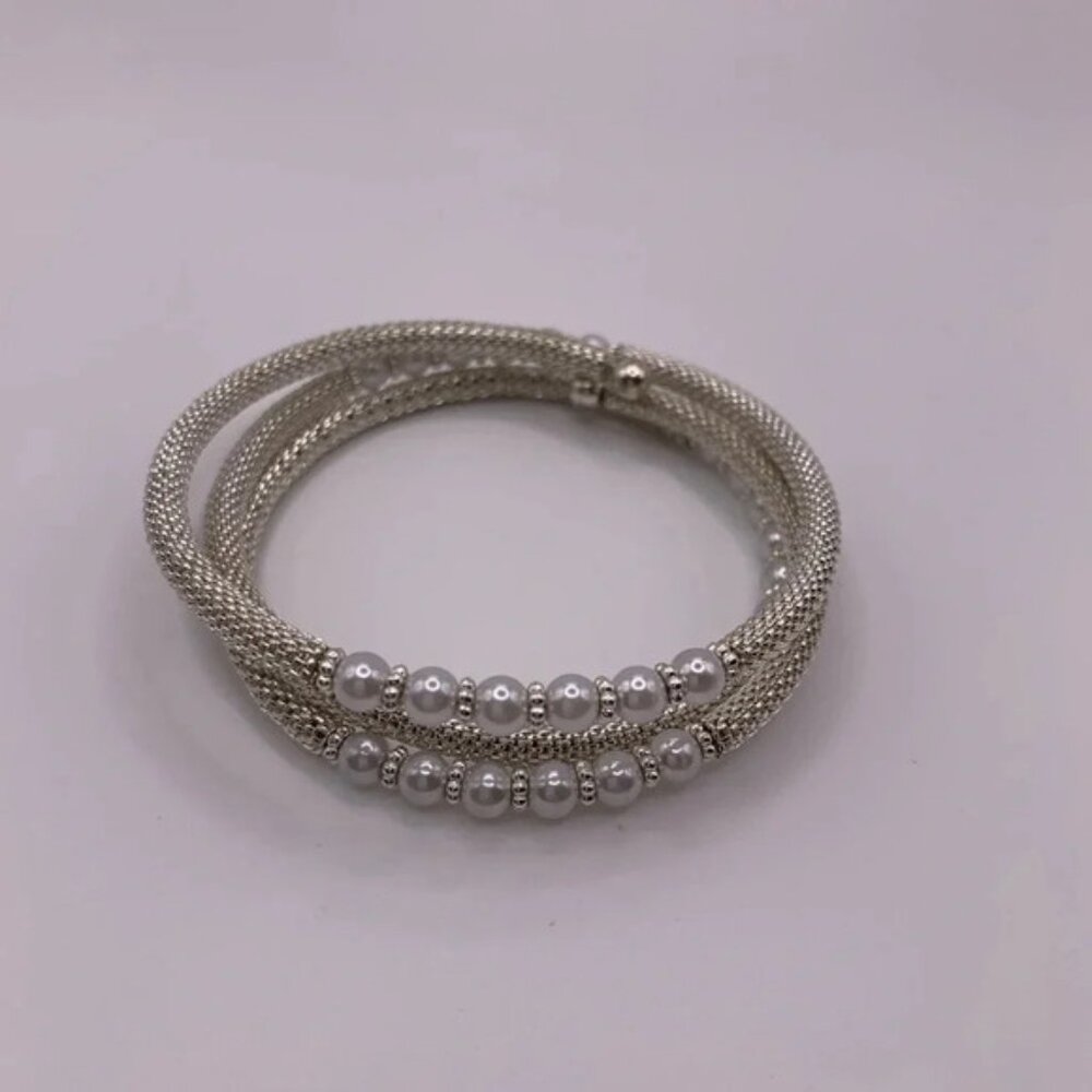 #110  Beautiful silver tone woven faux pearl coil bracelet